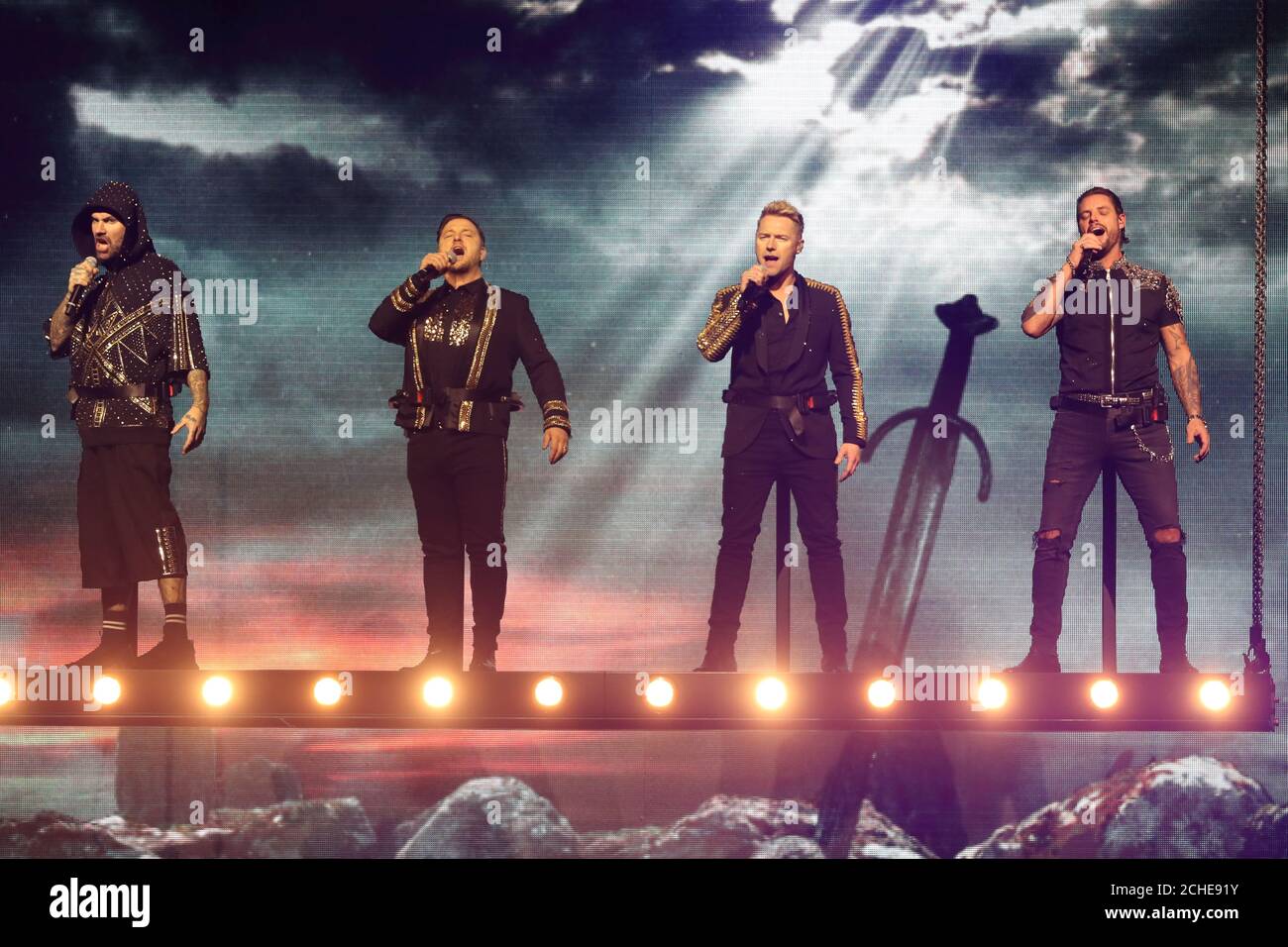 EDITORIAL USE ONLY (left to right) Shane Lynch, Mikey Graham, Ronan Keating and Keith Duffy of Boyzone on stage at the SSE Arena, Belfast, as part of the band's Thank You & Goodnight farewell tour. Stock Photo