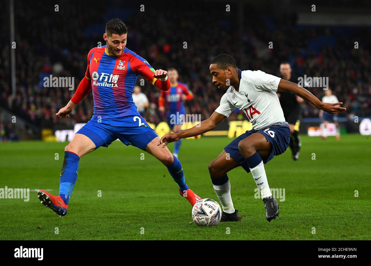 Crystal Palace's Joel Ward (left) and Tottenham Hotspur's Kyle Walker-Peters battle for the ball during the FA Cup fourth round match at Selhurst Park, London. Stock Photo