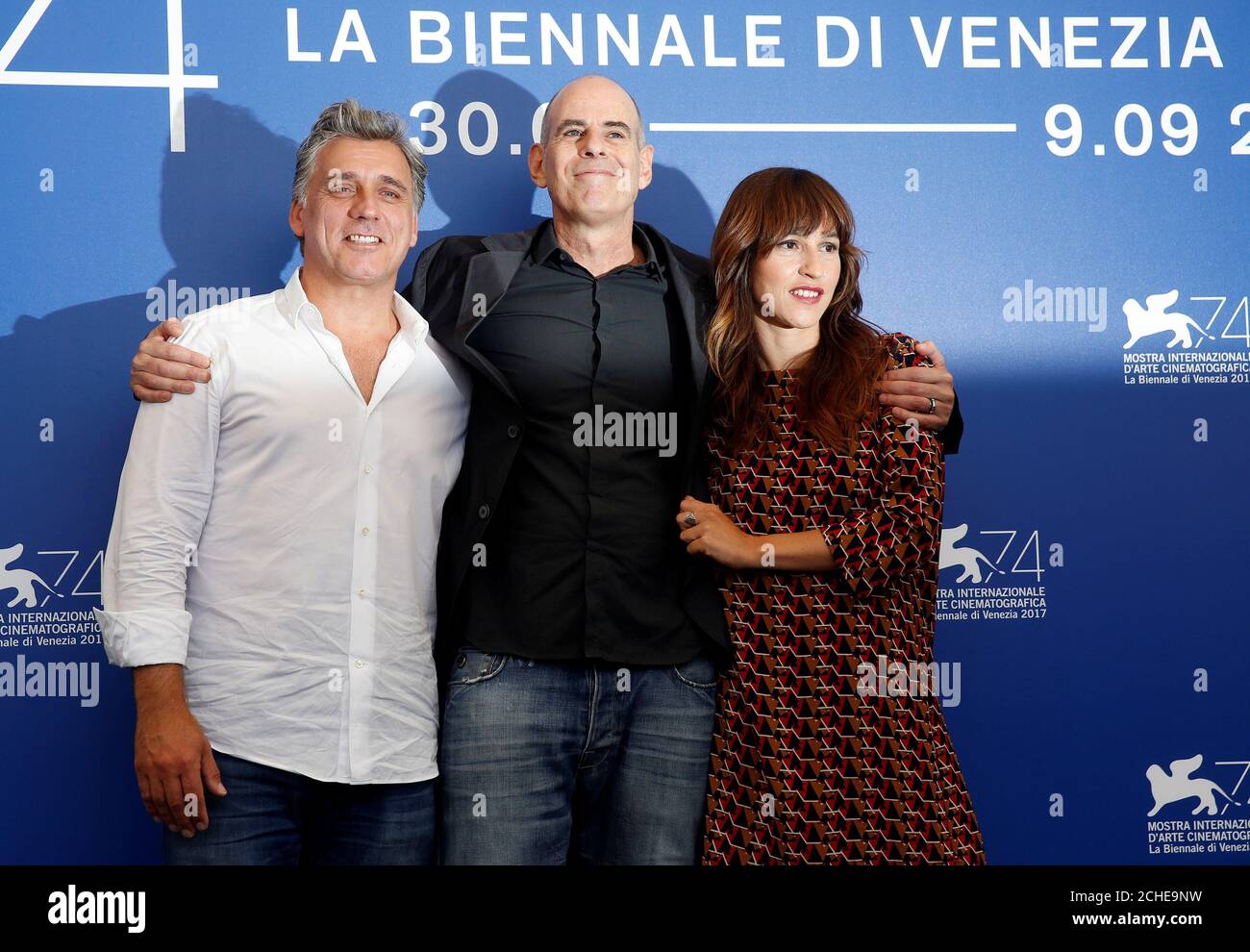 Director Samuel Maoz poses with actors Lior Ashkenazi and Sara Adler during a photocall for the movie 'Foxtrot' at the 74th Venice Film Festival in Venice, Italy September 2, 2017. REUTERS/Alessandro Bianchi Stock Photo