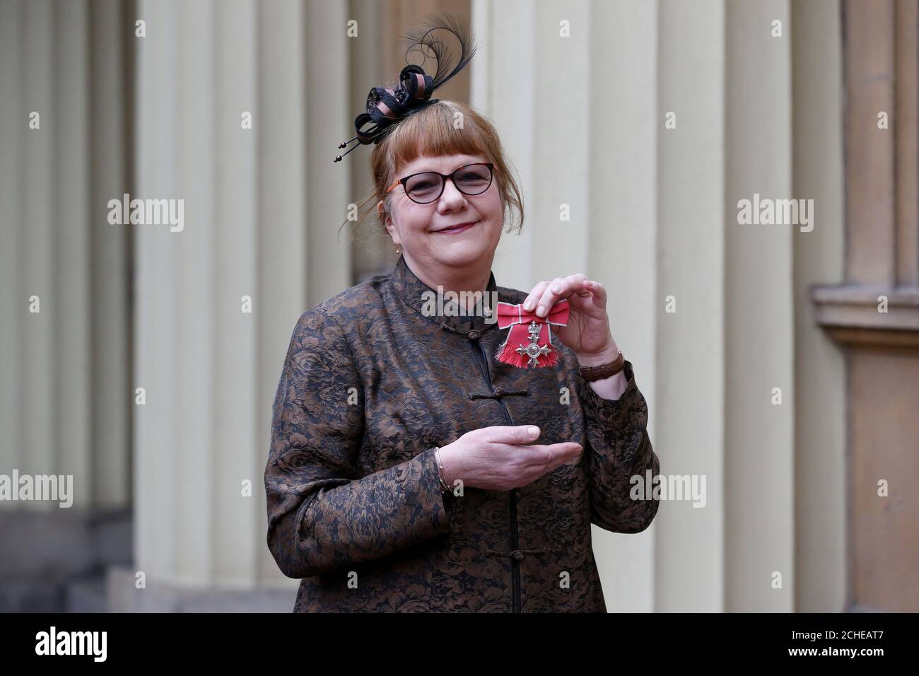 Rosemary Johnson, former Executive Director of the Royal Philharmonic Society, was made an MBE (Member of the Order of the British Empire) in an Investiture ceremony at Buckingham Palace, London. Stock Photo