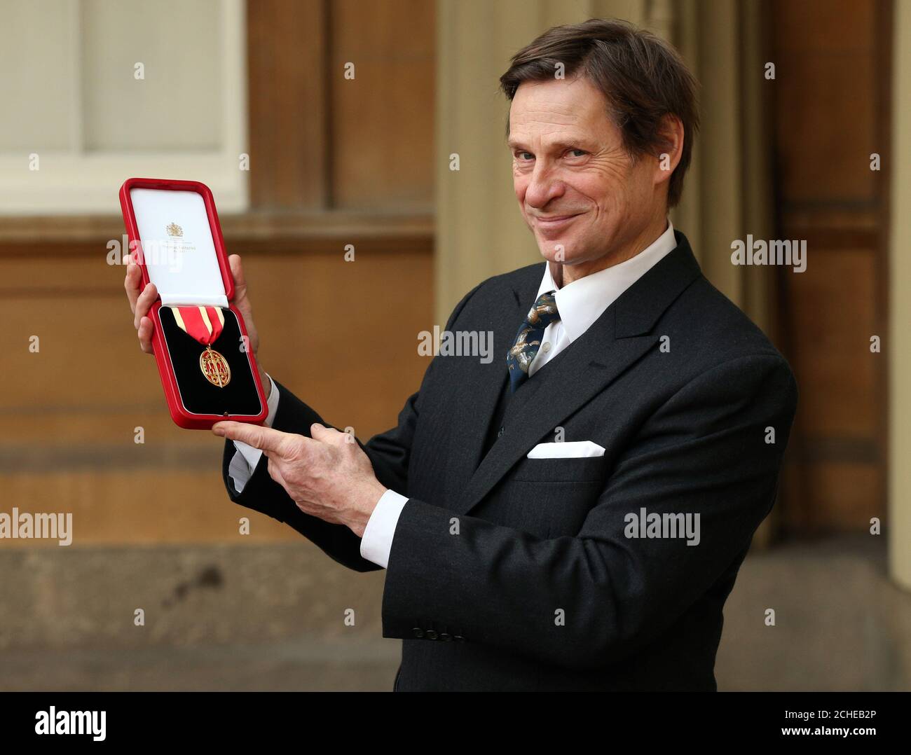 Simon Keenlyside following an Investiture ceremony at Buckingham Palace, London. Stock Photo