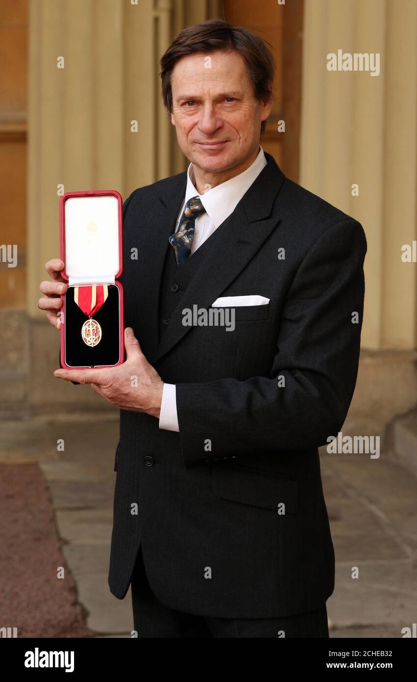 Simon Keenlyside following an Investiture ceremony at Buckingham Palace, London. Stock Photo