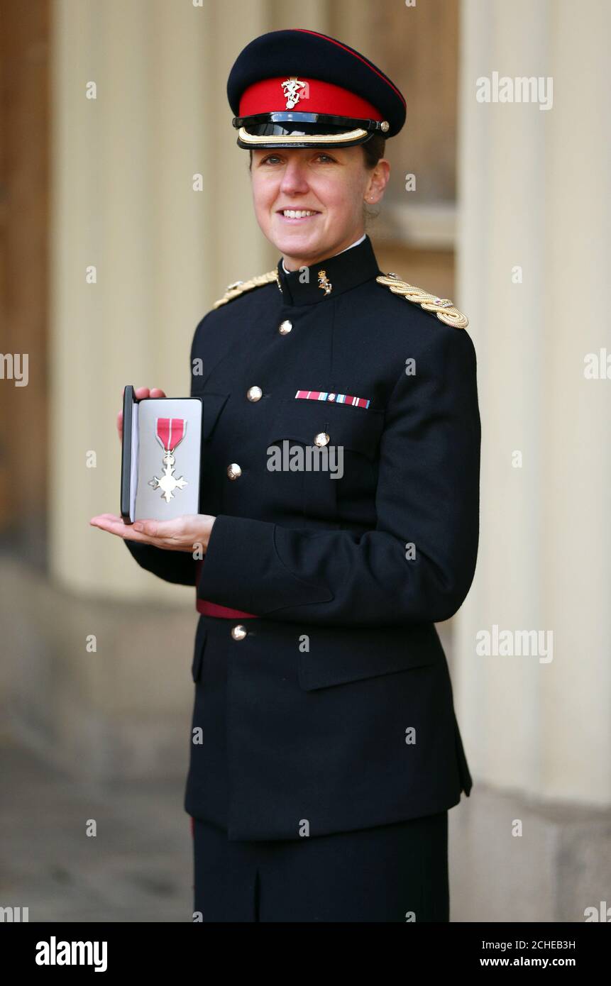 Rebecca Pogson-Hughes-Emanuel following an Investiture ceremony at Buckingham Palace, London. Stock Photo