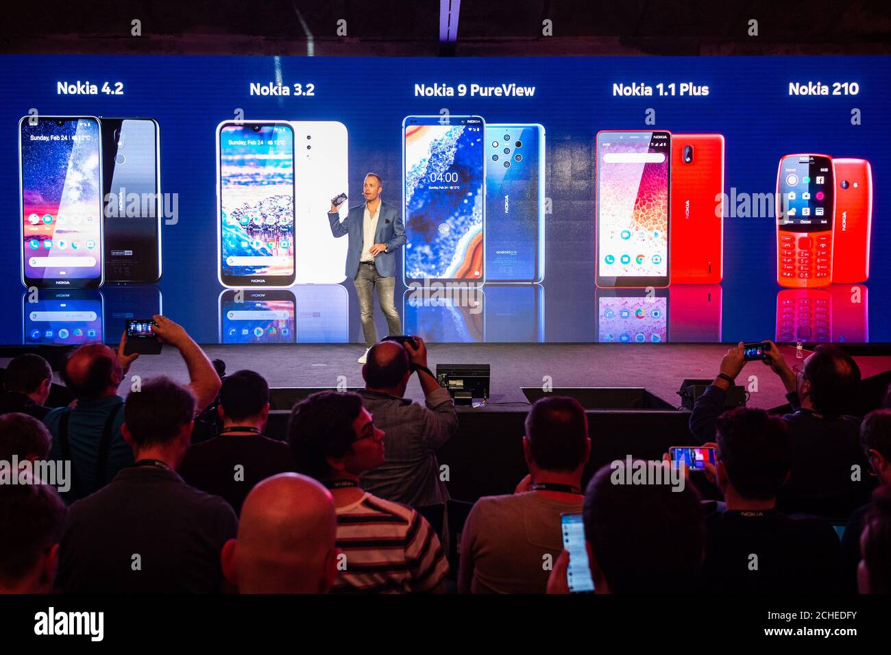 EDITORIAL USE ONLY Juho Sarvikas, Chief Product Officer, HMD Global, announces on stage 5 new Nokia handsets, which include the Nokia 9 Pureview, Nokia 4.2, Nokia 3.2, Nokia 1 Plus and the Nokia 210, at the Mobile World Congress in Barcelona. Stock Photo