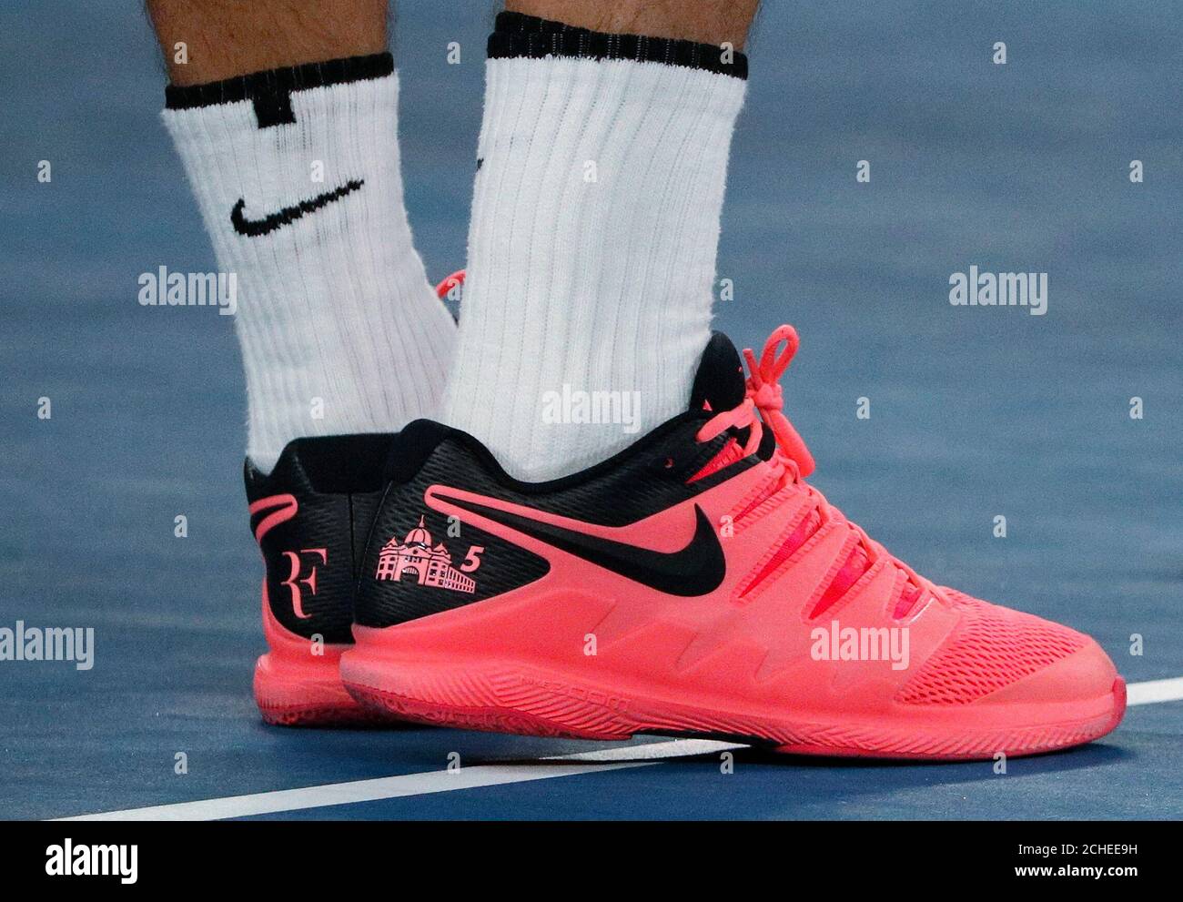 Tennis - Australian Open - Quarterfinals - Rod Laver Arena, Melbourne,  Australia, January 24, 2018. The shoes of Roger Federer of Switzerland are  pictured as he is interviewed on court after winning