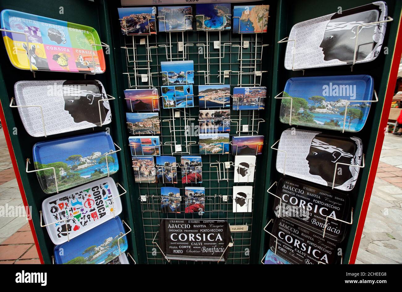 Corsican postcards and souvenir trays are displayed in Ajaccio on the  French Mediterranean island of Corsica, January 30, 2018. Picture taken  January 30, 2018. REUTERS/Jean-Paul Pelissier Stock Photo - Alamy