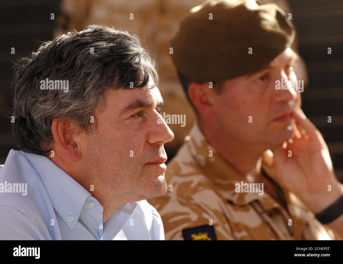 British Chancellor of the Exchequer Gordon Brown visits troops from the First Battalion, The Princess of Wales's Royal Regiment (PWRR), at Basra Air Station in southern Iraq where he announced at least Â£100 million in new aid for reconstruction. Stock Photo
