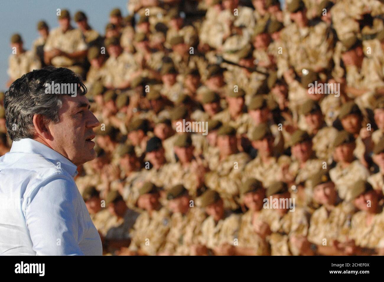 British Chancellor of the Exchequer Gordon Brown addresses troops from the First Battalion, The Princess of Wales's Royal Regiment (PWRR), at Basra Air Station in southern Iraq where he announced at least £100 million in new aid for reconstruction. Stock Photo