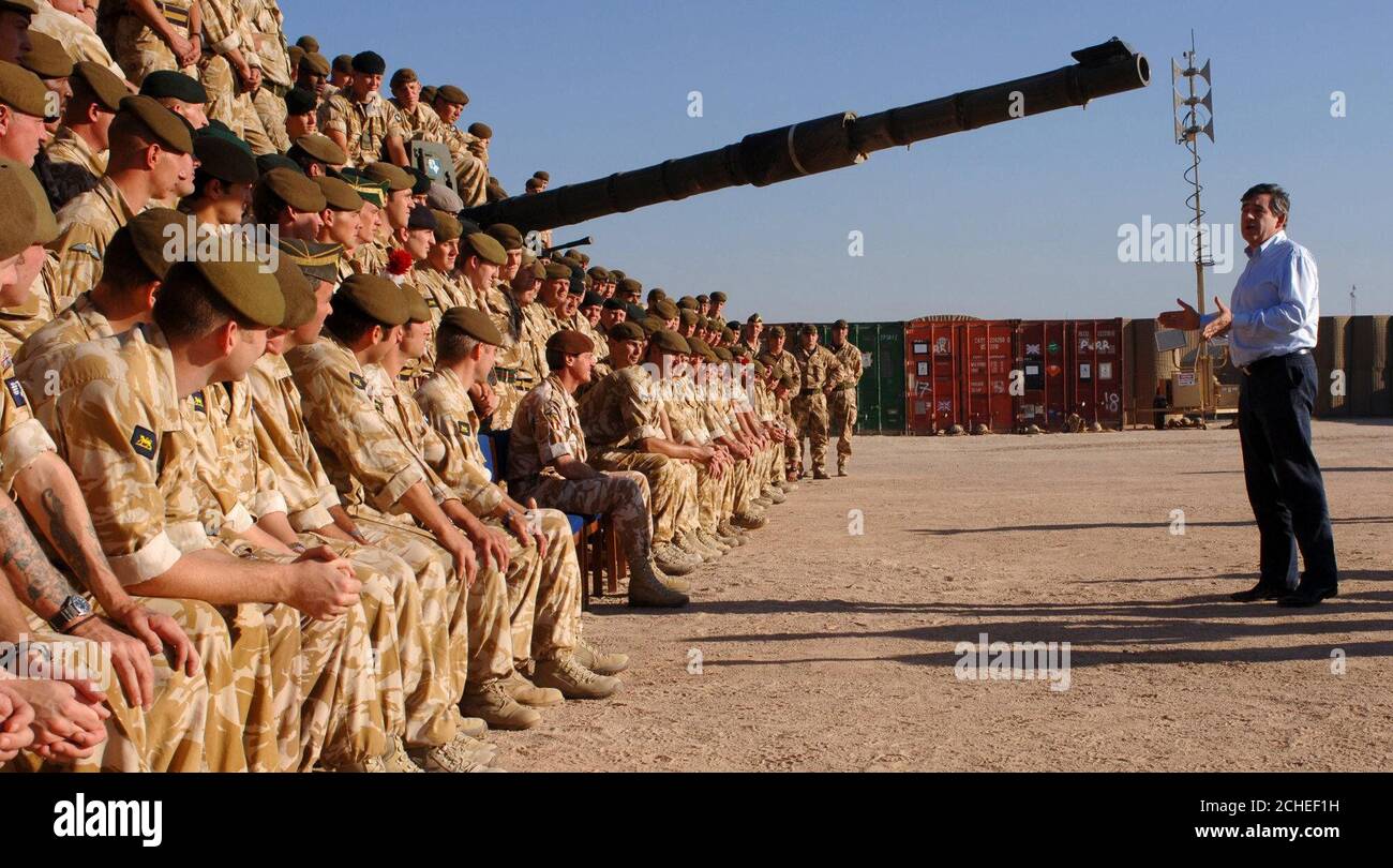 British Chancellor of the Exchequer Gordon Brown addresses troops from the First Battalion, The Princess of Wales's Royal Regiment (PWRR), at Basra Air Station in southern Iraq where he announced at least Â£100 million in new aid for reconstruction. Stock Photo