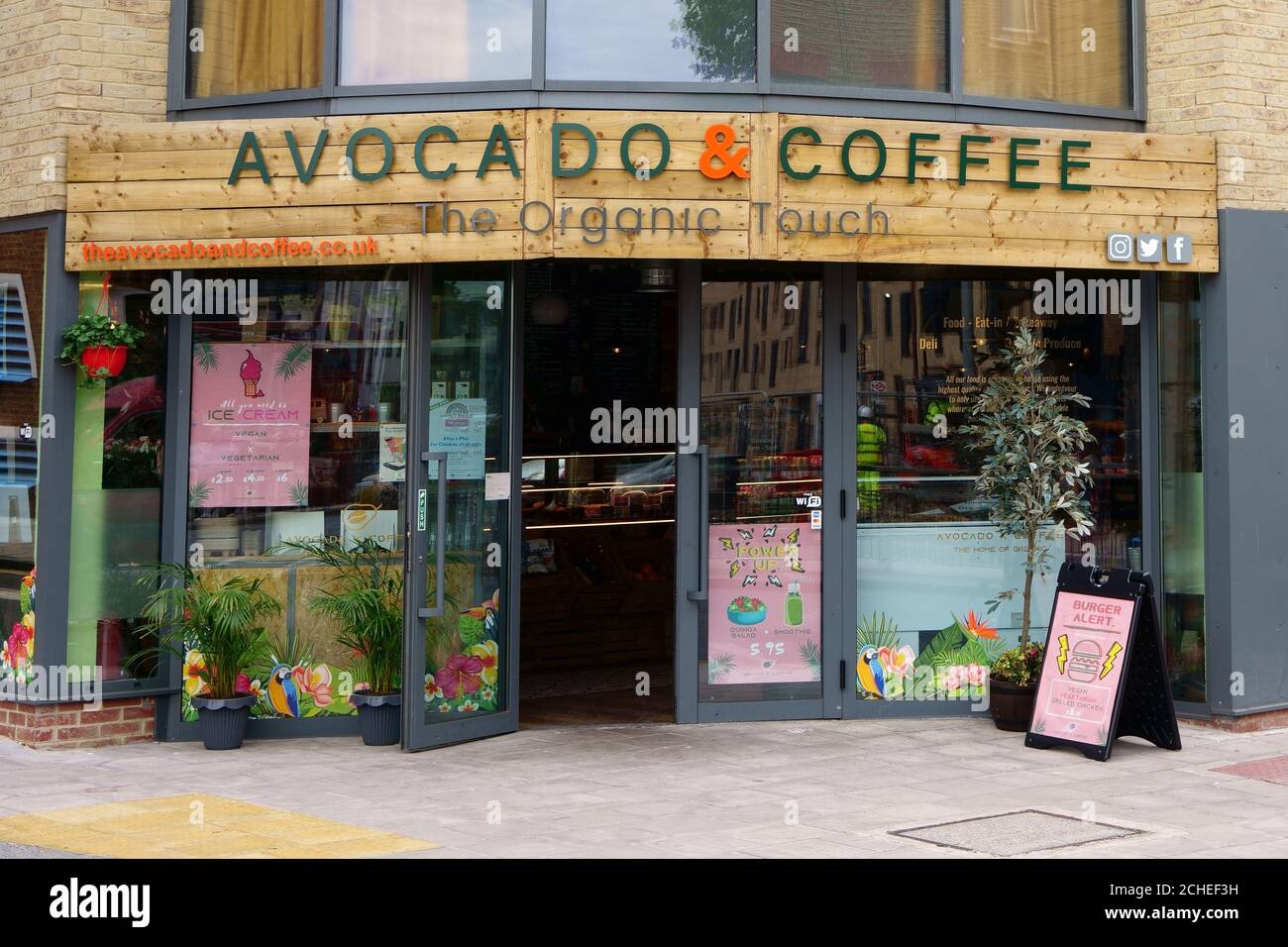 The Avocado and Coffee in Greenwich, London, UK. Organic, vegetarian and vegan products. Modern lifestyle coffee shop. Stock Photo
