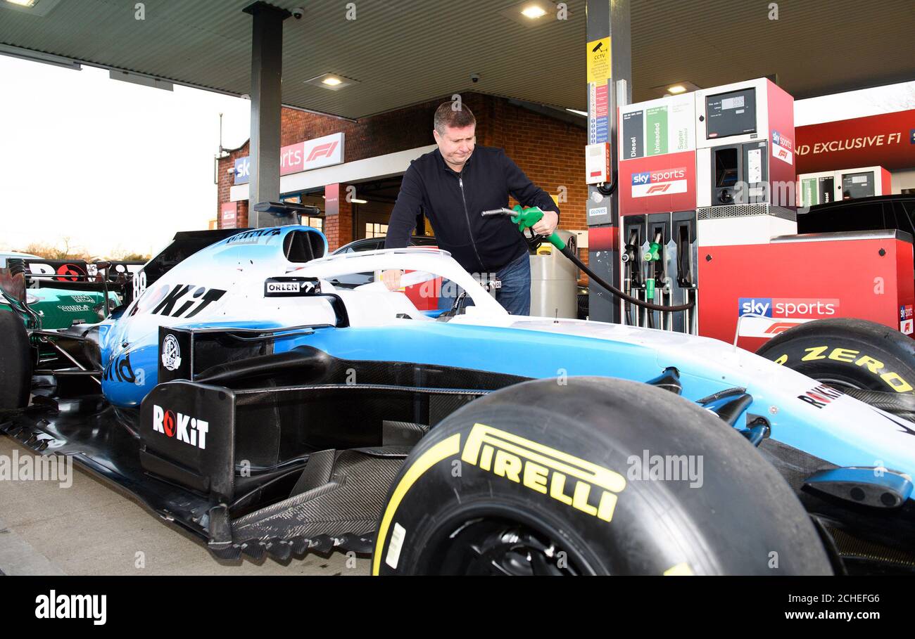 EDITORIAL USE ONLY David Croft, lead commentator, pumps petrol as Sky sports F1 takes over a garage in High Wycombe in Buckinghamshire, to give drivers the ultimate pit stop experience to celebrate