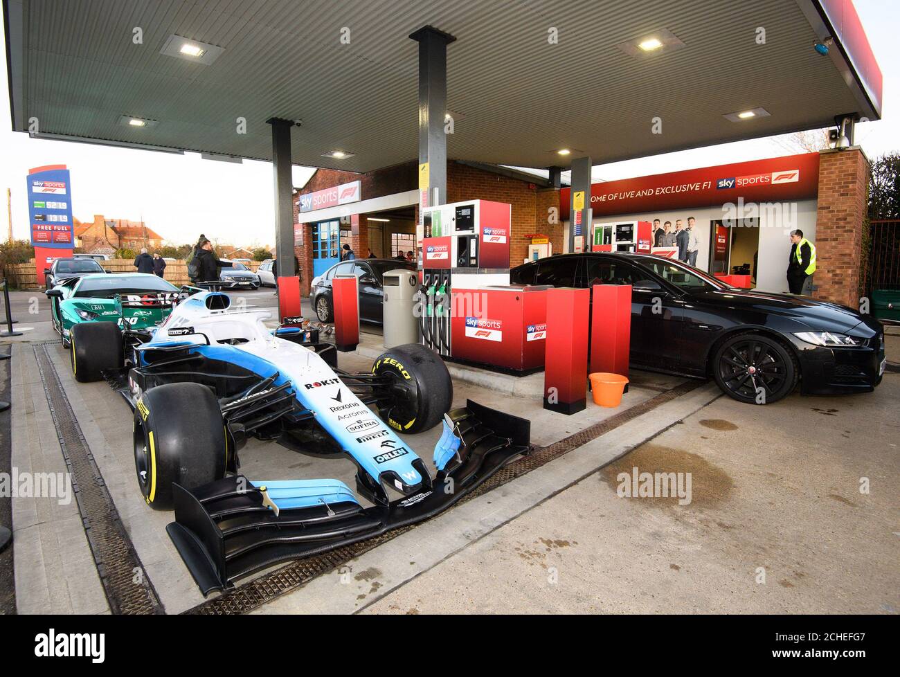 EDITORIAL USE ONLY An F1 car sits on the forecourt as Sky Sports F1 takes over a garage in High Wycombe in Buckinghamshire, to give drivers the ultimate pit stop experience to