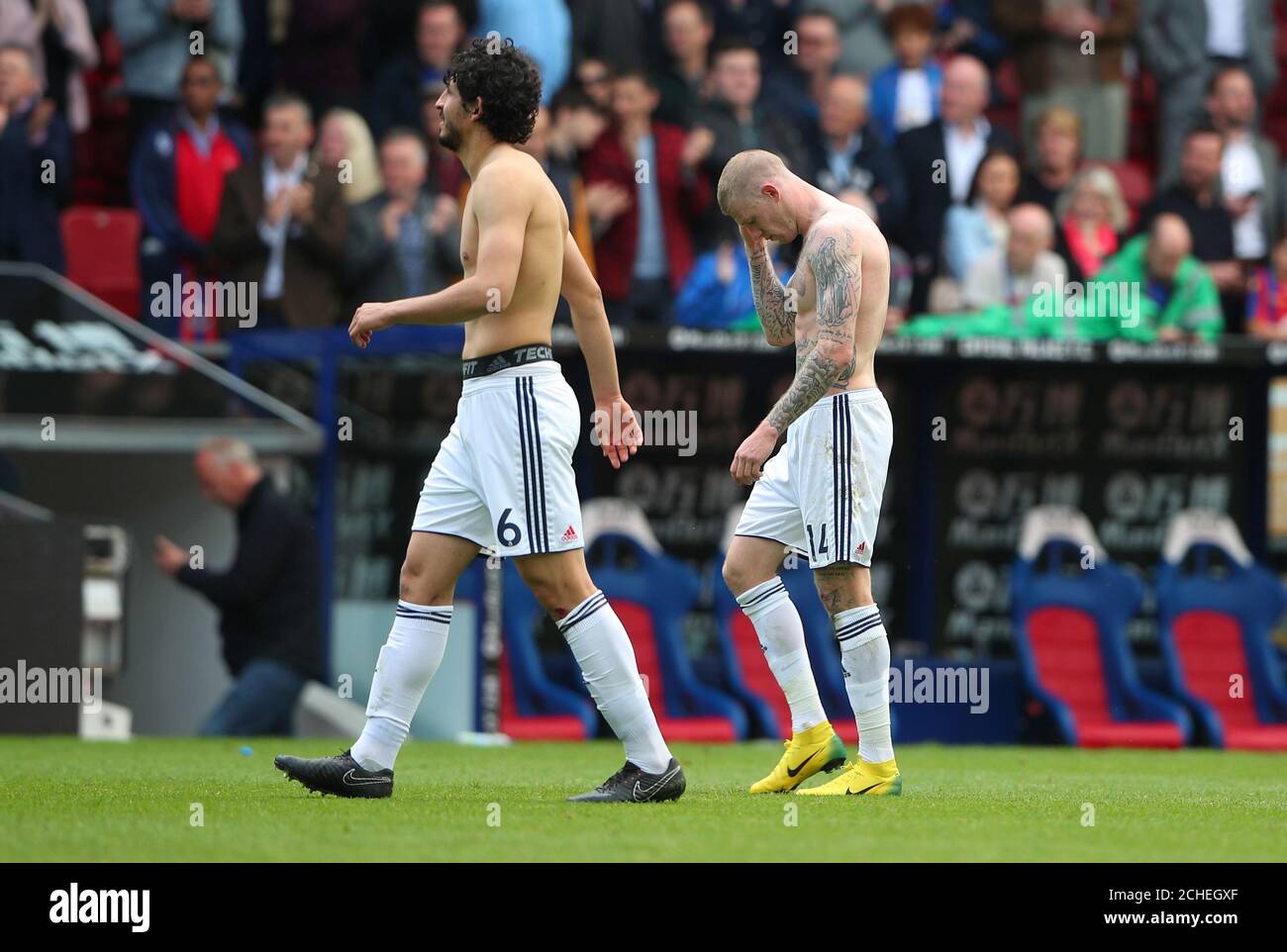 Soccer Football - Premier League - Crystal Palace vs West Bromwich Albion - Selhurst Park, London, Britain - May 13, 2018   West Bromwich Albion's Ahmed Hegazi and James McClean look dejected after the match   REUTERS/Hannah McKay    EDITORIAL USE ONLY. No use with unauthorized audio, video, data, fixture lists, club/league logos or 'live' services. Online in-match use limited to 75 images, no video emulation. No use in betting, games or single club/league/player publications.  Please contact your account representative for further details. Stock Photo
