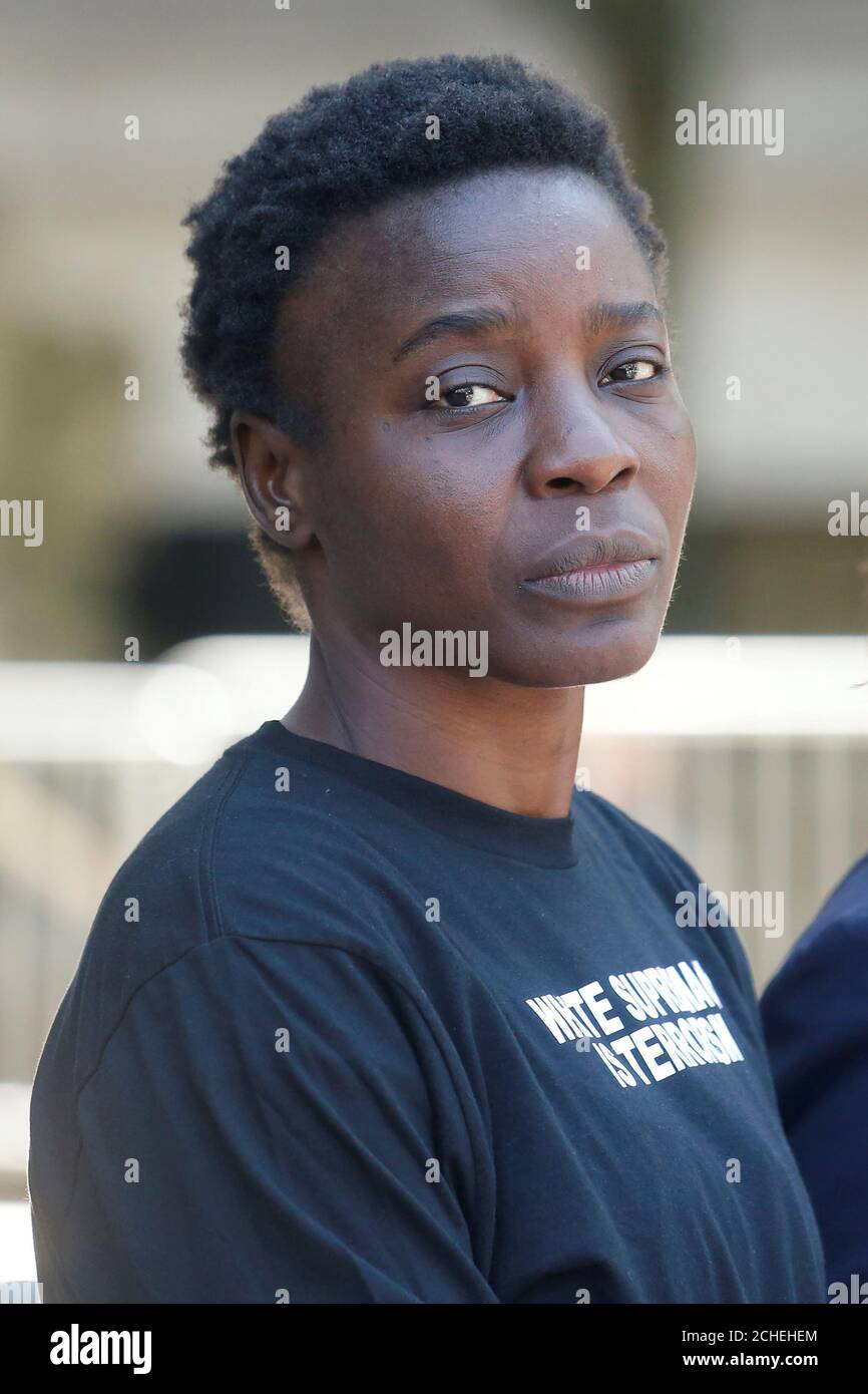 Patricia Okoumou looks on after leaving federal court from her arraignment, a day after authorities say she scaled the stone pedestal of the Statue of Liberty to protest U.S. immigration policy, in Manhattan, New York, U.S., July 5, 2018.  REUTERS/Shannon Stapleton Stock Photo