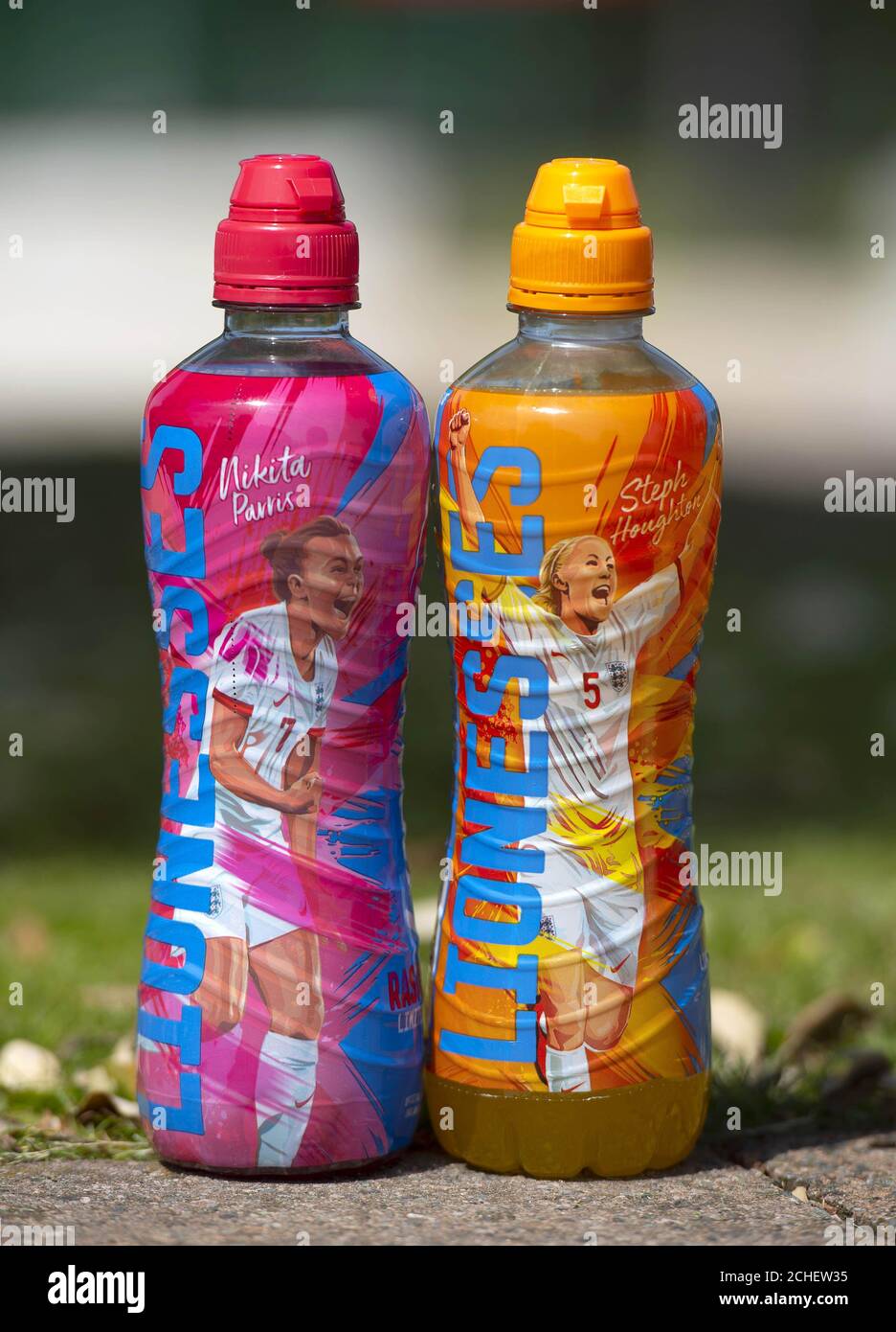 2 drinks bottles celebrating England women’s football stars, created by Lucozade Sport in support of the England Lionesses and the women’s game in general. Stock Photo