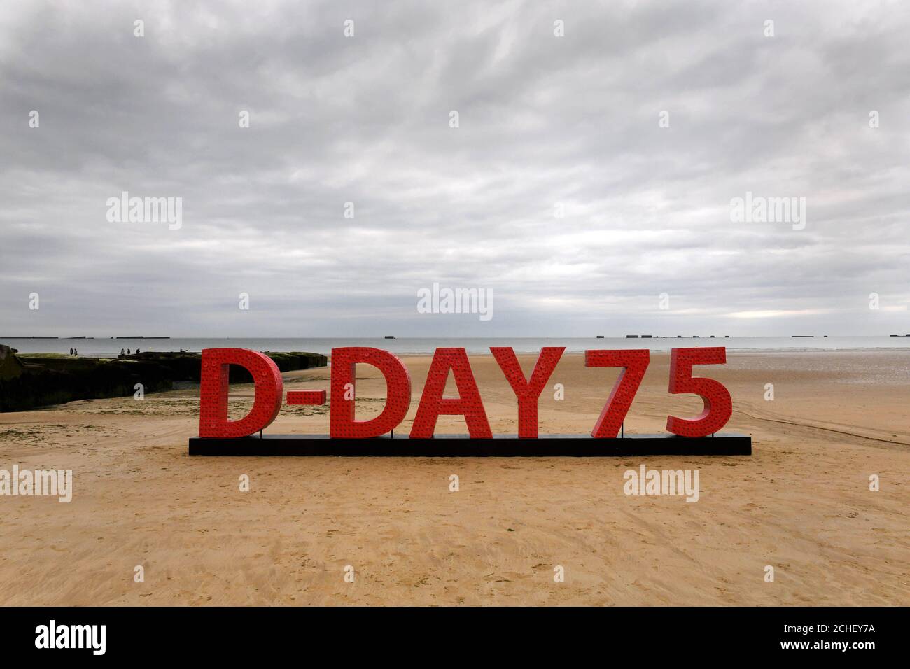 EDITORIAL USE ONLY An installation made from 20,000 poppies with messages from supporters of the Royal British Legion goes on display to commemorate the 75th anniversary of the D-Day landings at the beaches of Arromanches in Normandy, France. Stock Photo