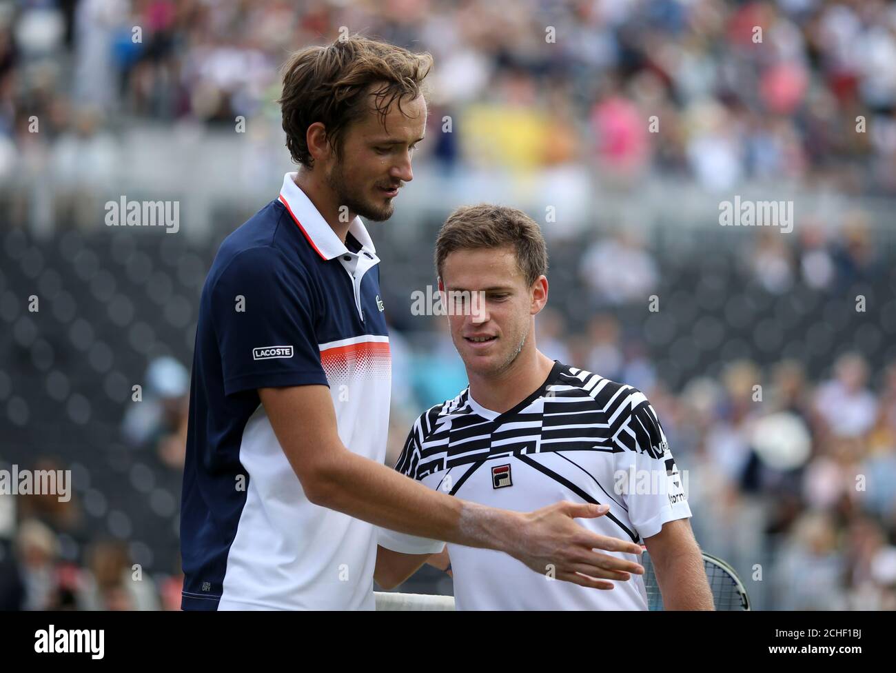 Daniil Medvedev left celebrates beating Diego Schwartzman during