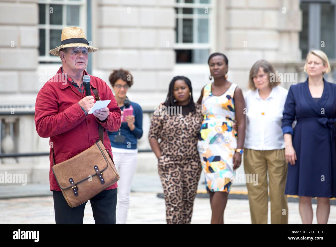 EDITORIAL USE ONLY Writer Michael Morpurgo speaks at the Fly The Flag event at Somerset House to celebrate the start of a week of events and a new human rights flag designed by artist and activist Ai Weiwei, which has been commissioned by a wide-ranging group of arts organisations and human rights charities to mark the 70th anniversary of the Universal Declaration of Human Rights at Somerset House in London. Stock Photo