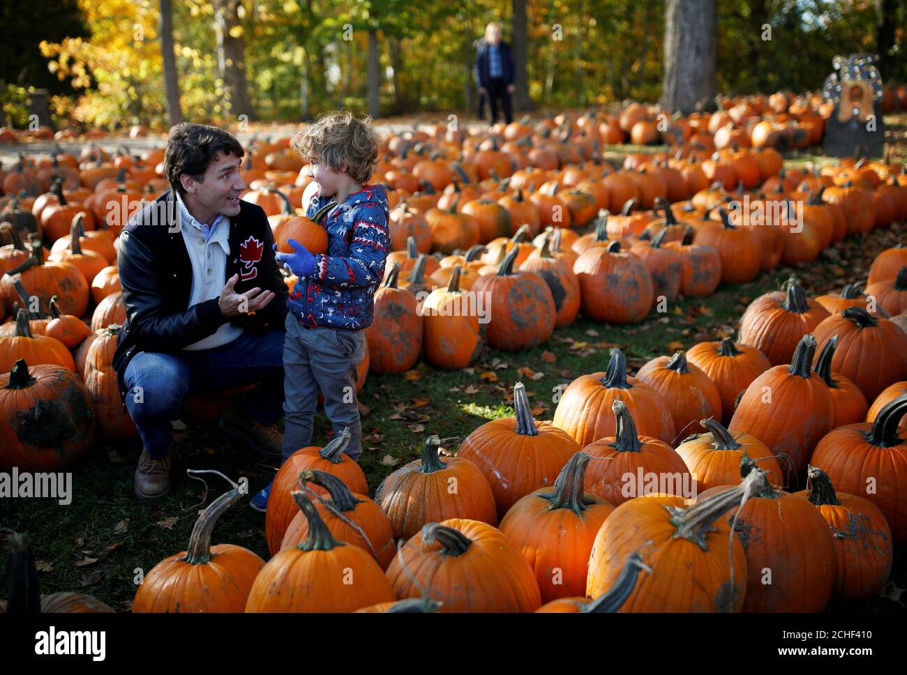Liberal leader and Canadian Prime Minister Justin Trudeau kisses his son  Hadrien in a pumpkin patch as he visits a farm during an election campaign  visit to Manotick near Ottawa, Ontario, Canada