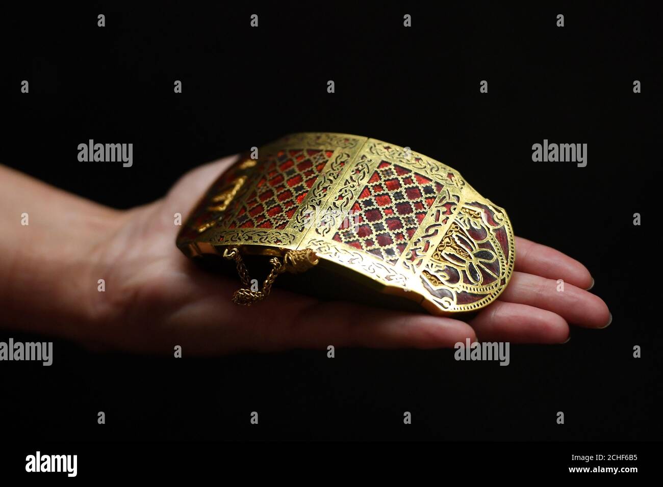 A replica of an ornate shoulder clasp, believed to have belonged to King Raedwald of East Anglia, on display in the new exhibition at the National Trust's Sutton Hoo site in Suffolk following a ??4m revamp. Stock Photo