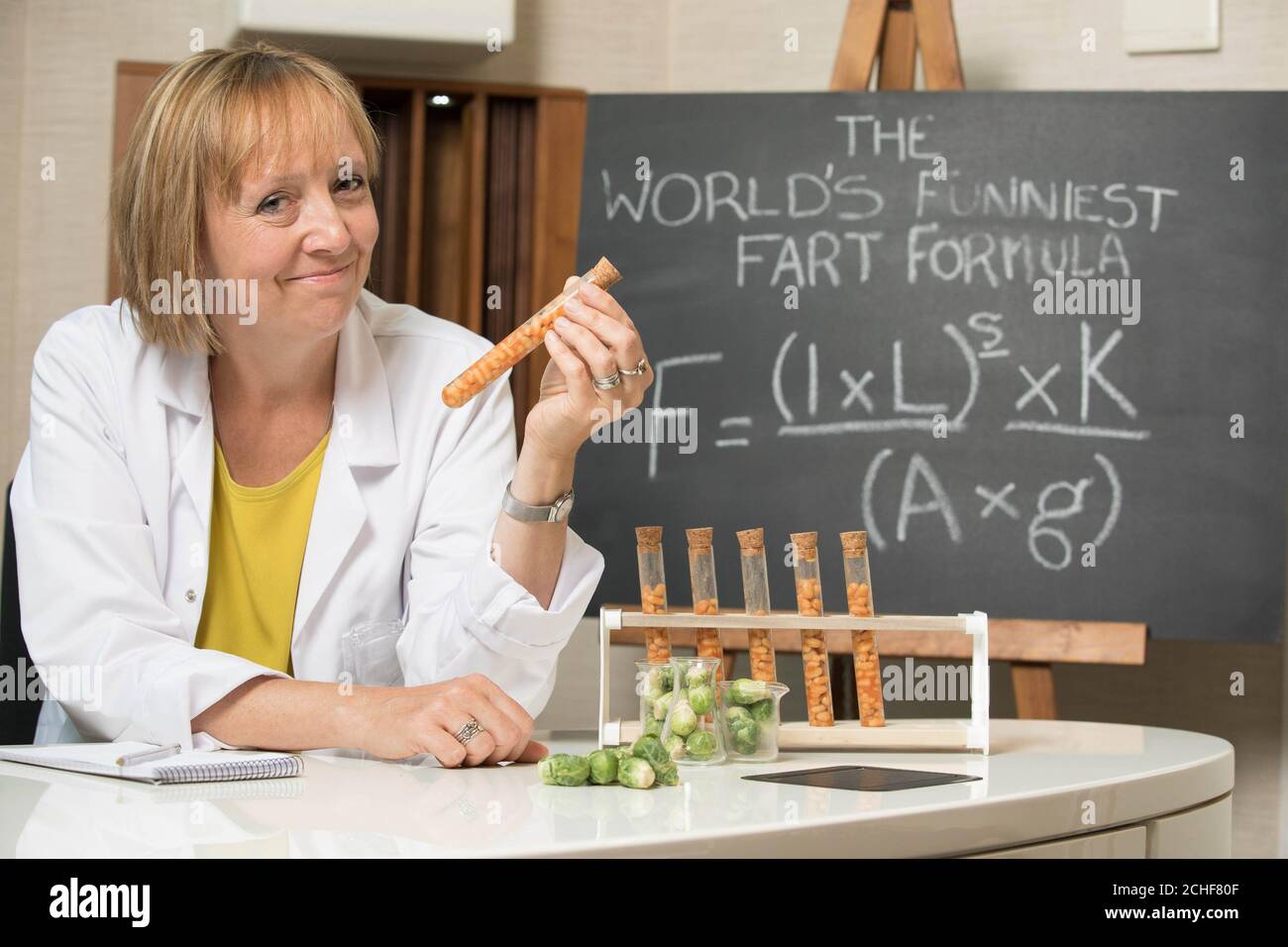 Scientist Dr Helen Pilcher reveals the mathematical formula for the world's funniest fart according to science, which has been discovered for a new study titled the 'Flatulence Report' commissioned by Beano. Stock Photo