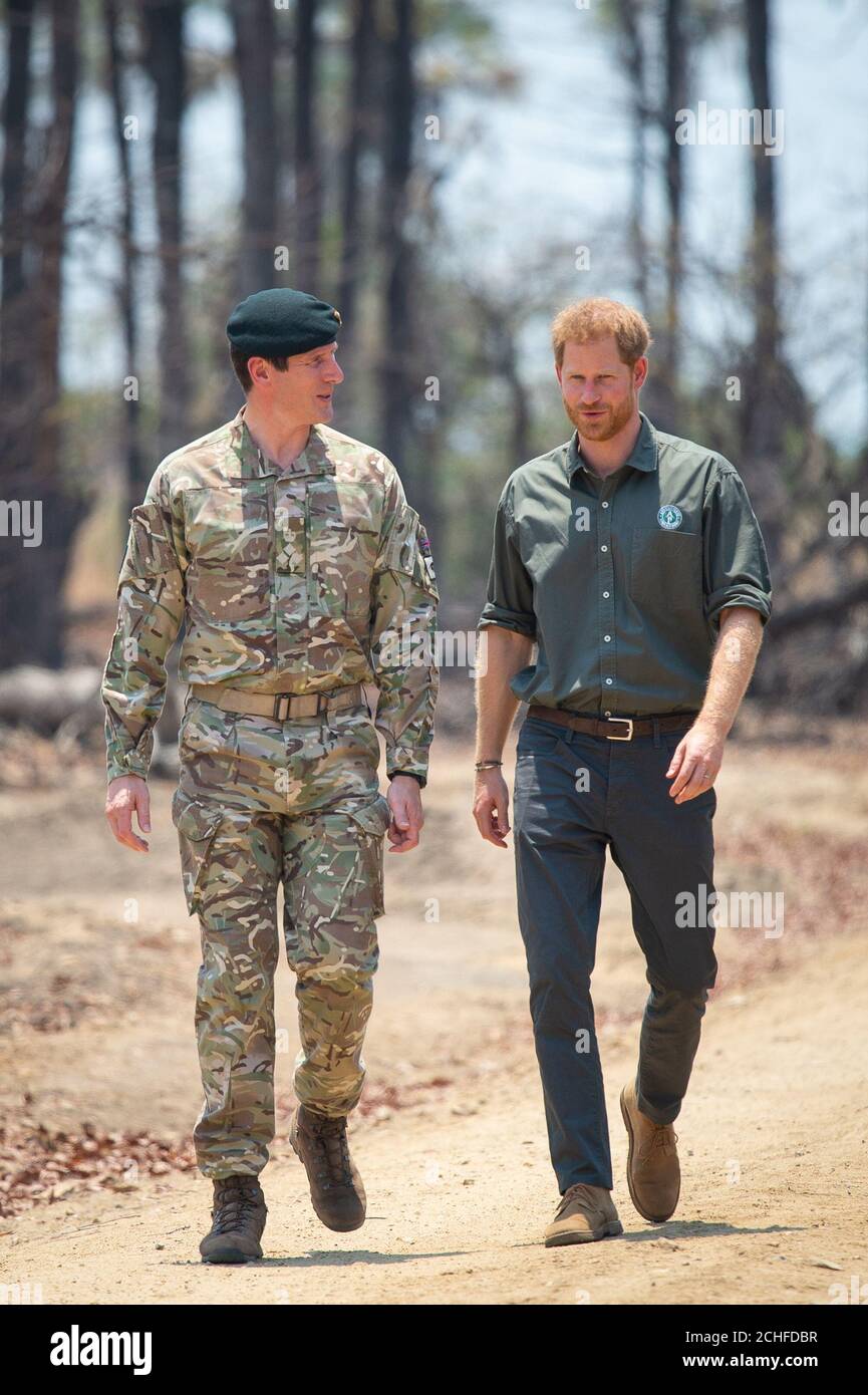 The Duke of Sussex arrives with Brigadier Tom Bateman to pay tribute to Guardsman Mathew Talbot, who was killed whilst on a joint anti-poaching patrol, at Liwonde National Park Malawi. PA Photo. Picture date: Monday September 30, 2019. See PA story ROYAL Tour . Photo credit should read: Dominic Lipinski/PA Wire Stock Photo