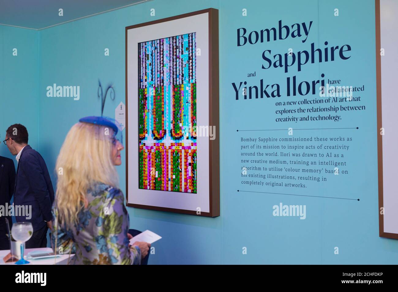 EDITORIAL USE ONLY Guests attend the Bombay Sapphire Stir Creativity Lounge at Frieze London, where the gin brand is launching a new Artificial Intelligence art collection in collaboration with artist Yinka Ilori. Stock Photo