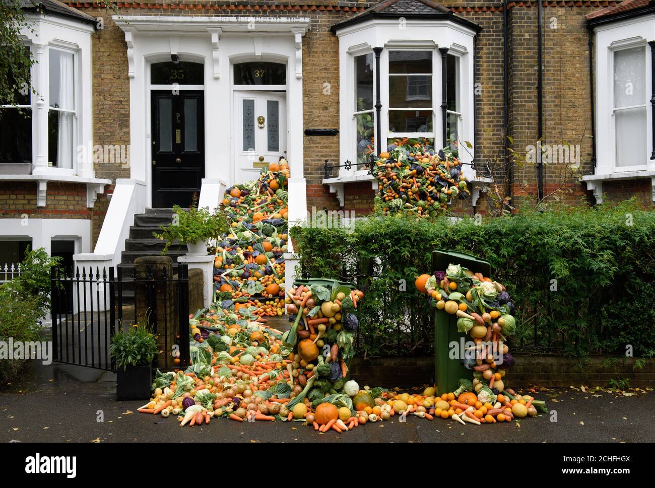 A residential London home has been temporarily transformed using the amount of food binned by just 14 households over the course of a year. Stock Photo