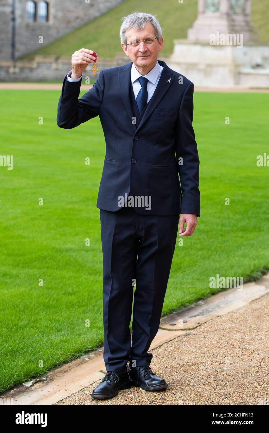 Dr James Beveridge with the OBE he received from Queen Elizabeth II at ...