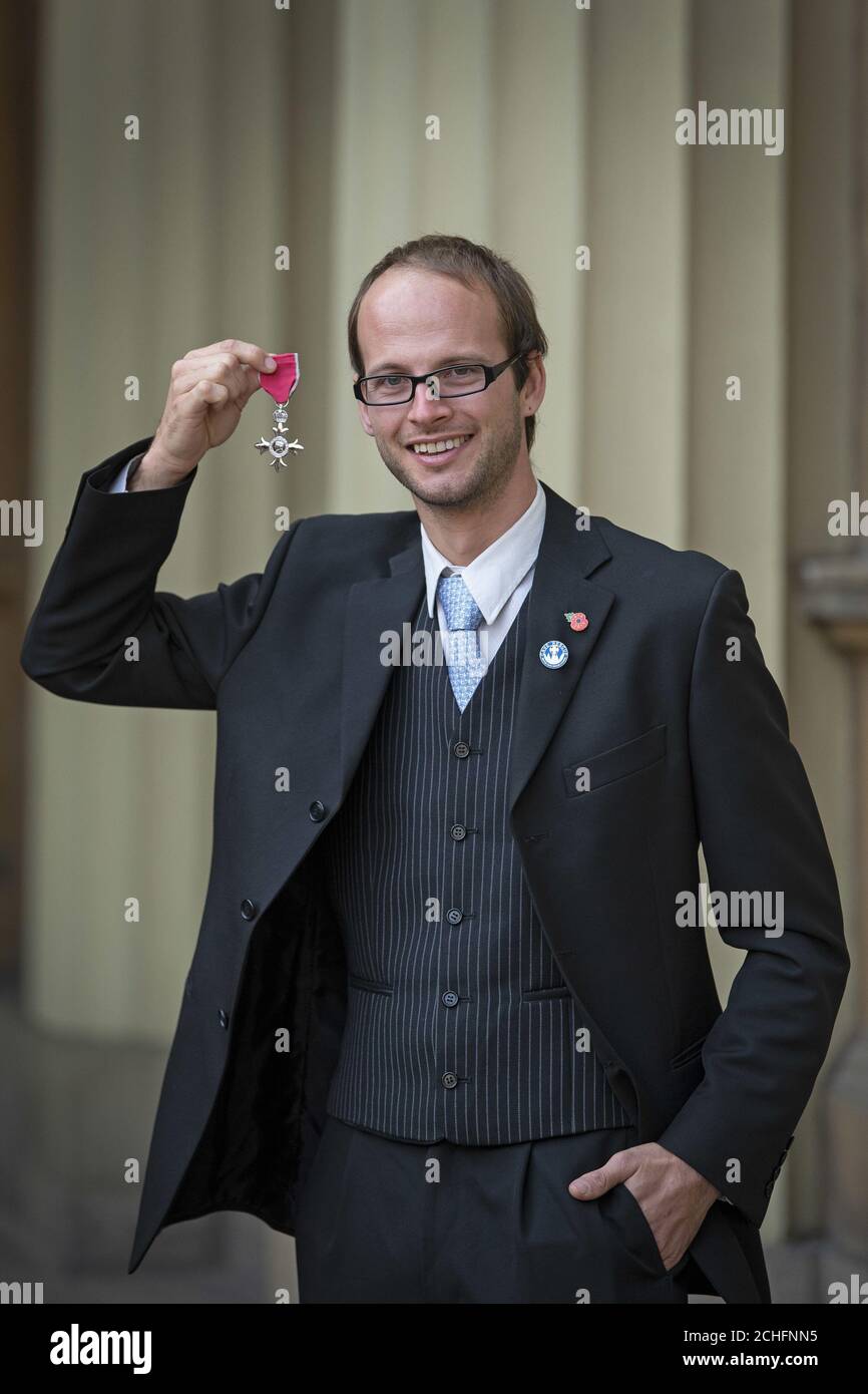 Thai cave rescue diver Joshua Bratchley with his MBE following an investiture ceremony at Buckingham Palace, London. PA Photo. Picture date: Thursday October 31, 2019. See PA story ROYAL Investiture. Photo credit should read: Victoria Jones/PA Wire Stock Photo