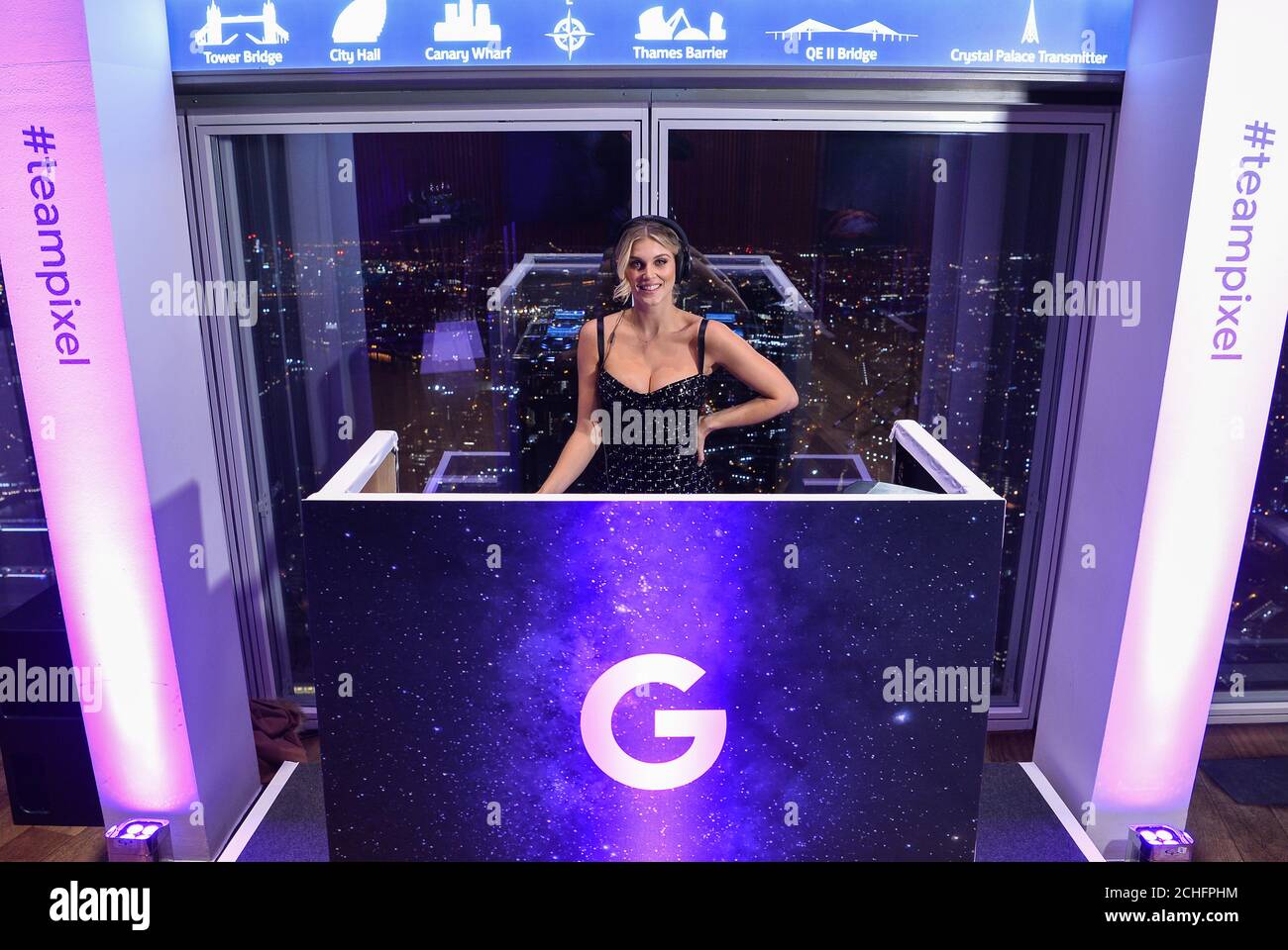 EDITORIAL USE ONLY DJ Ashley James takes to the decks for guests at an astrophotography evening hosted by Google Pixel 4 at the Shard, London. Stock Photo