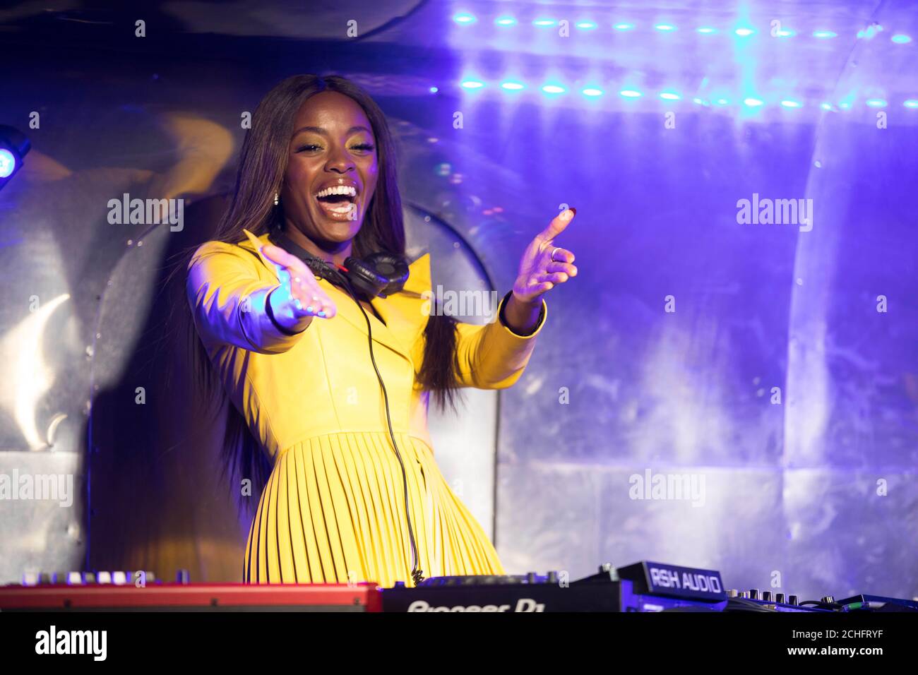 DJ AJ Odudu performs during the Seven Dials Christmas lights switch on, in partnership with housing and homelessness charity Shelter, London. Stock Photo