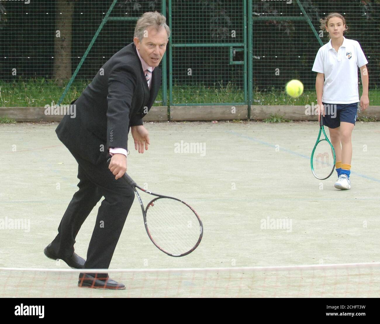PA file photo dated 14.05.2007 of former Prime Minister Tony Blair playing tennis at Windsor High School in Halesowen. Stock Photo