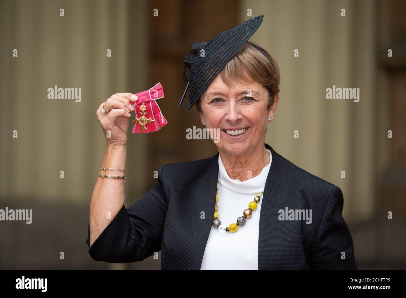 Sheila Morrow with her OBE medal, following an investiture ceremony at Buckingham Palace, London. PA Photo. Picture date: Thursday November 21, 2019. See PA story ROYAL Investitures. Photo credit should read: Dominic Lipinski/PA Wire Stock Photo