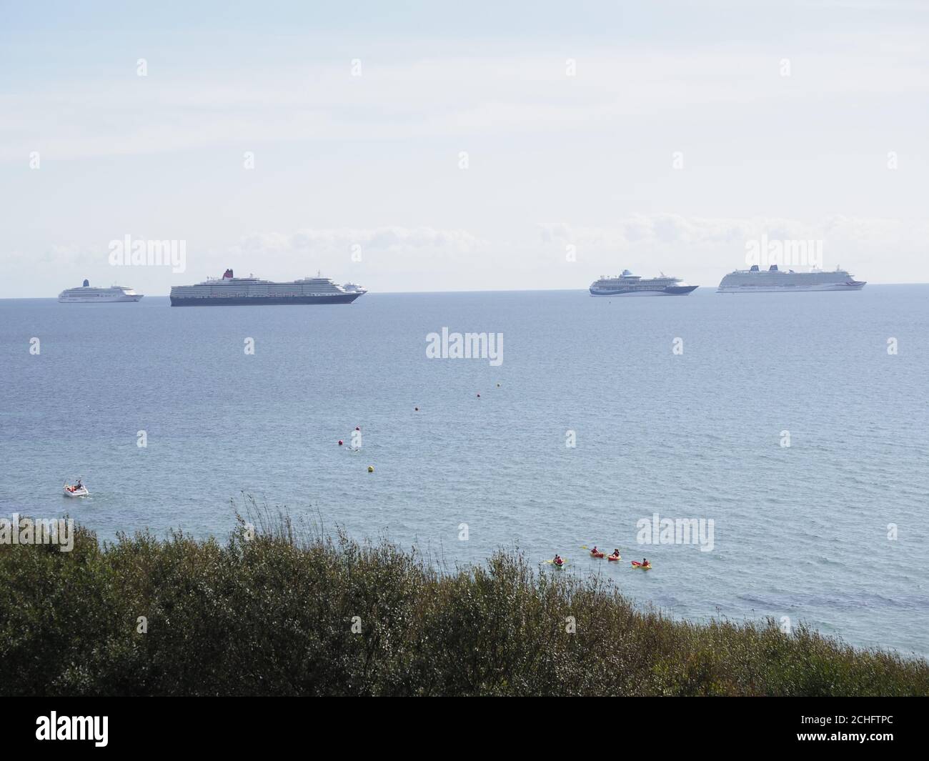 moored surplus cruise ships in the bay at Weymouth in Dorset united Kingdom  Stock Photo