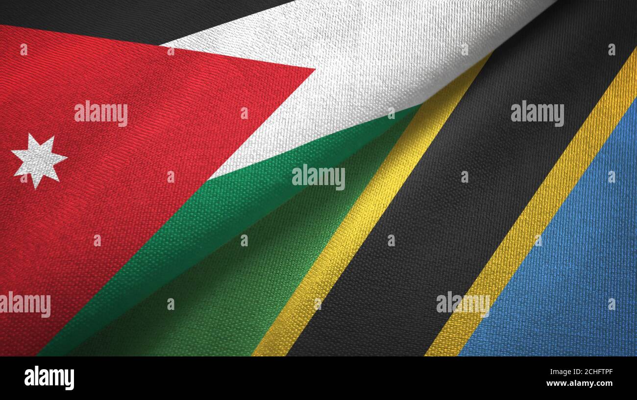 Jordan and Tanzania two flags textile cloth, fabric texture Stock Photo