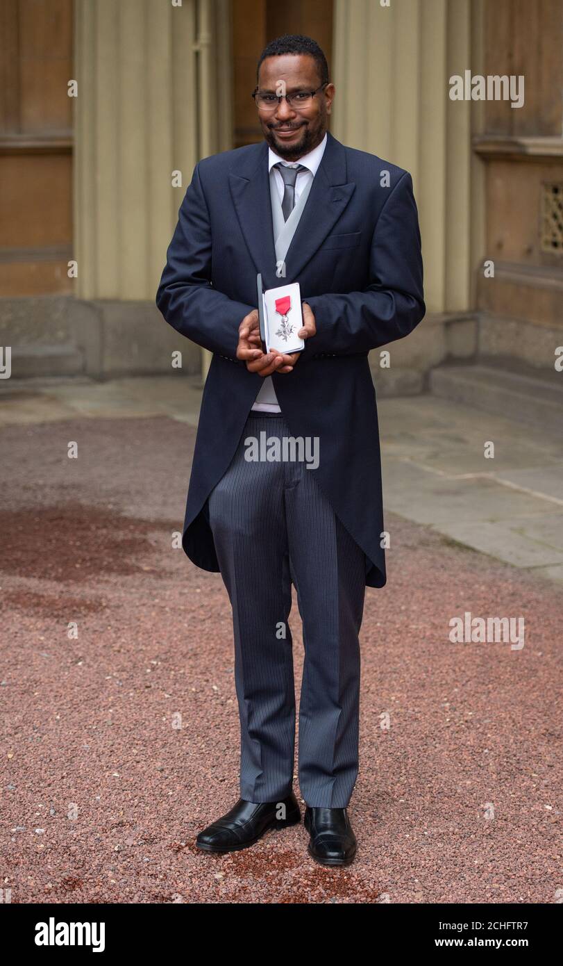 Christie Spurling with his MBE medal, following an investiture ceremony at Buckingham Palace, London. PA Photo. Picture date: Thursday November 21, 2019. See PA story ROYAL Investitures. Photo credit should read: Dominic Lipinski/PA Wire Stock Photo