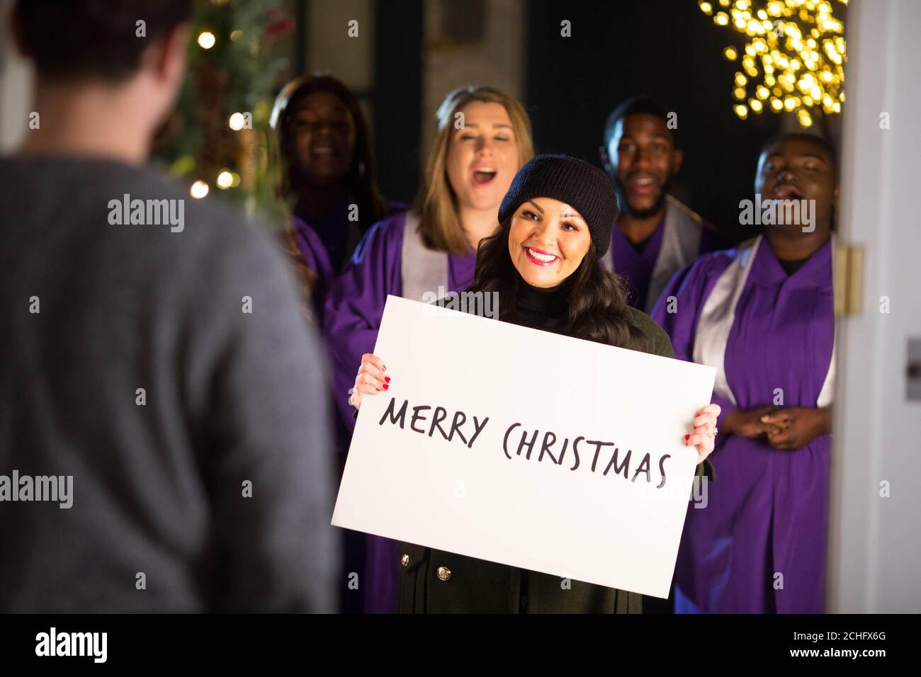 EDITORIAL USE ONLY Martine McCutcheon joins Christmas carollers to launch a sweet treat giveaway by online food delivery service Uber Eats in partnership with Tinseltown. PA Photo: Issue date: Tuesday December 3, 2019. Lucky customers will receive from the Tinseltown restaurant a Banoffee pie or chocolate biscuits via the online food delivery service in London on December 6th and Birmingham on December 9th. Photo credit should read: David Parry/PA Wire Stock Photo