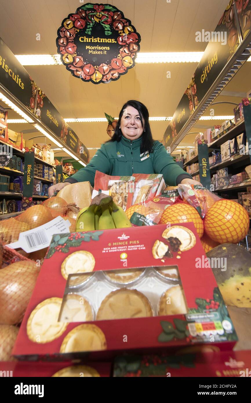 EDITORIAL USE ONLY Bev Kelly, who is a Community Champion for Morrisons in Wakefield, makes a supermarket Christmas film to investigate where daily unsold produce goes once its donated to charity. Stock Photo