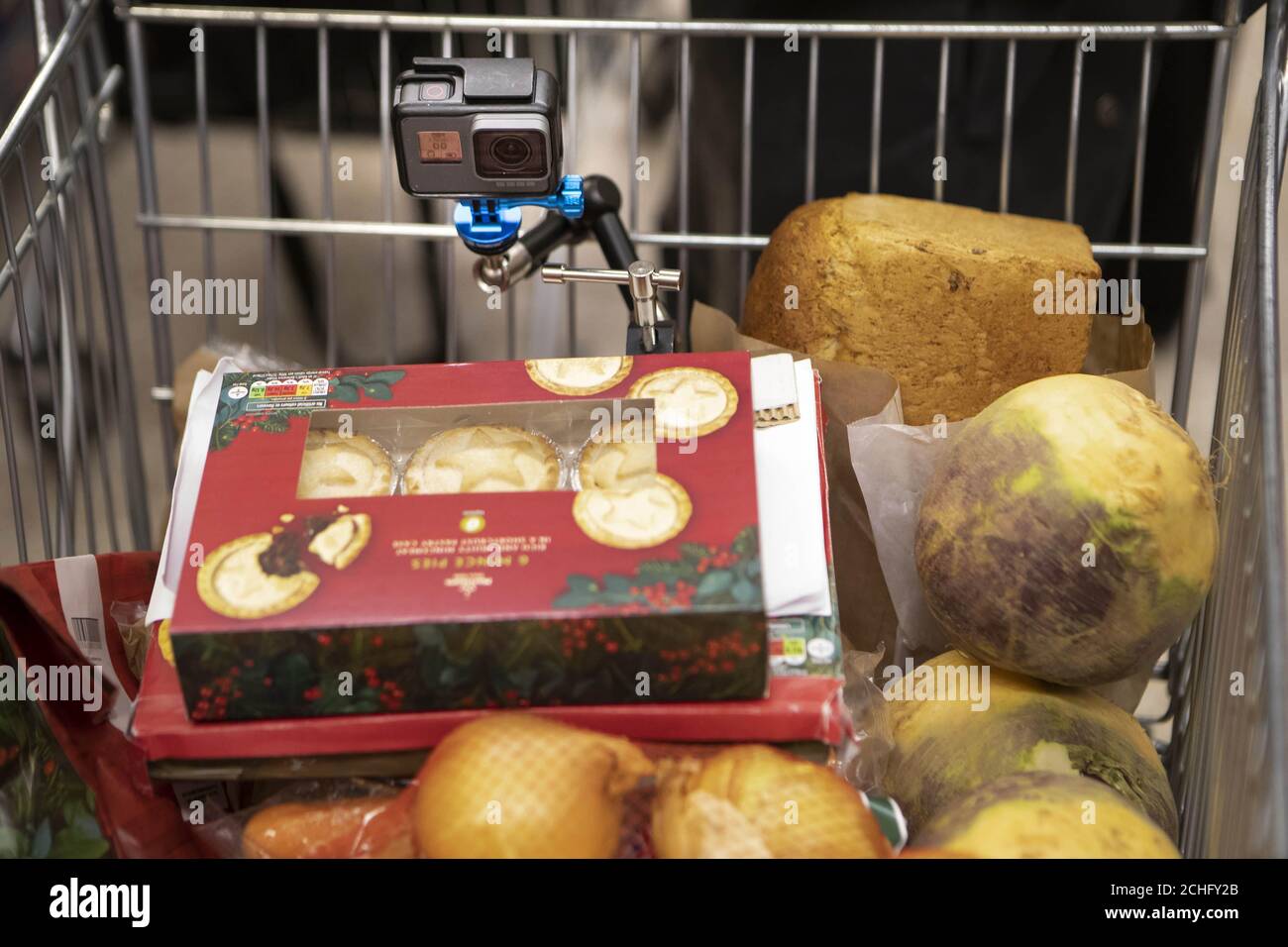 Colleagues Lesley Shaw and Bev Kelly, who are both Community Champions for Morrisons in Wakefield, make a supermarket Christmas film to investigate where daily unsold produce goes once its donated to charity. Stock Photo