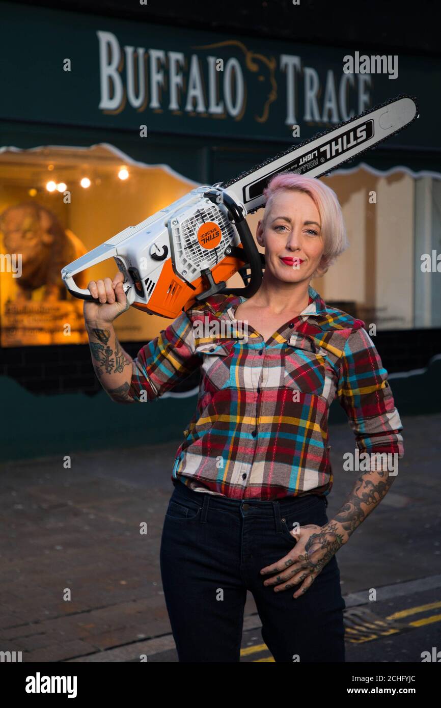 American chainsaw artist, Griffon Ramsey unveils a 2-metre red wood sculpture, created during a live demonstration to mark the launch of her exhibition, which is sponsored by bourbon whiskey brand Buffalo Trace at StolenSpace gallery in Shoreditch, London. PA Photo. Picture date: Monday December 16, 2019. The artwork took over 30 hours to create using gas and electric-powered chainsaws in front of a live audience. Photo credit should read: David Parry/PA Wire Stock Photo