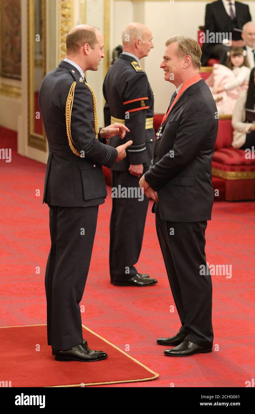 Christopher Nolan is made a CBE (Commander of the Order of the British Empire) by the Duke of Cambridge at Buckingham Palace. Stock Photo