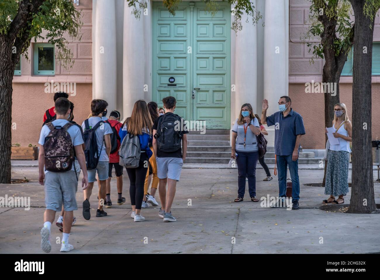 Barcelona, Spain. 14th Sep, 2020. A team of teachers of the Pau Claris Institute seen welcoming students on the first day of class.The school year begins in Catalonia between hygienic security measures and mandatory distancing of students due to the Covid pandemic. Credit: SOPA Images Limited/Alamy Live News Stock Photo
