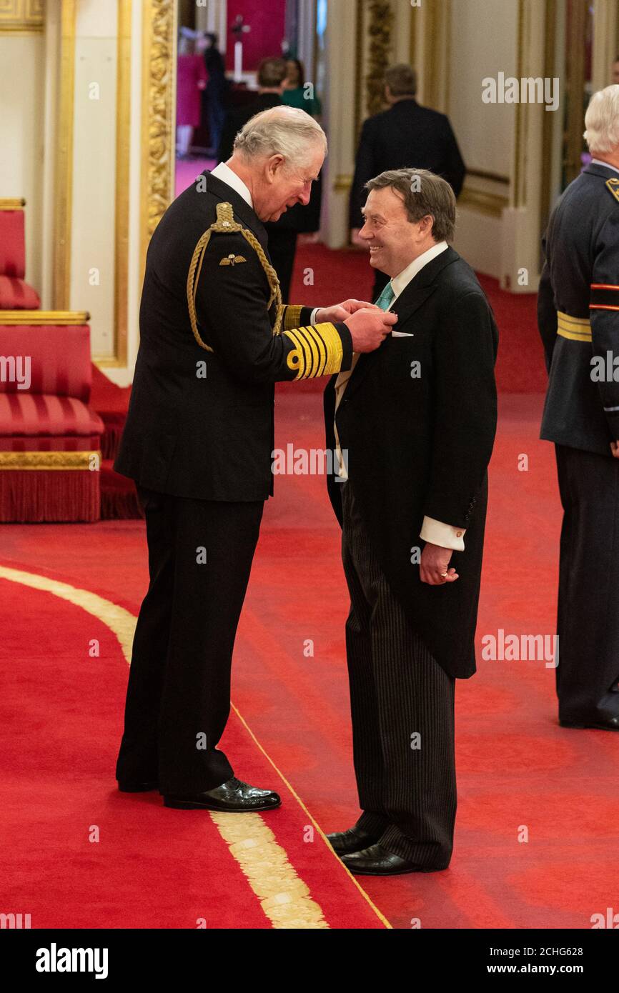 Nicholas Henderson is made an OBE (Officer of the Order of the British Empire) by the Prince of Wales during an investiture ceremony at Buckingham Palace in London. Picture date: Thursday March 5, 2020. See PA story ROYAL Investiture. Photo credit should read: Dominic Lipinski/PA Wire Stock Photo