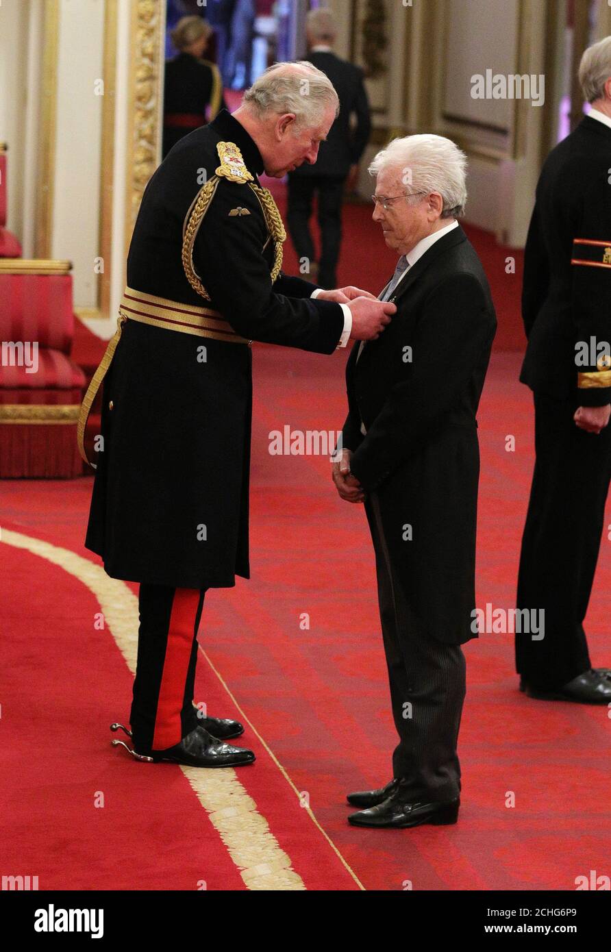 Michael Prendergast from Wrexham, known professionally as Mike Pender, is made an MBE (Member of the Order of the British Empire) by the Prince of Wales during an investiture ceremony at Buckingham Palace, London. Stock Photo