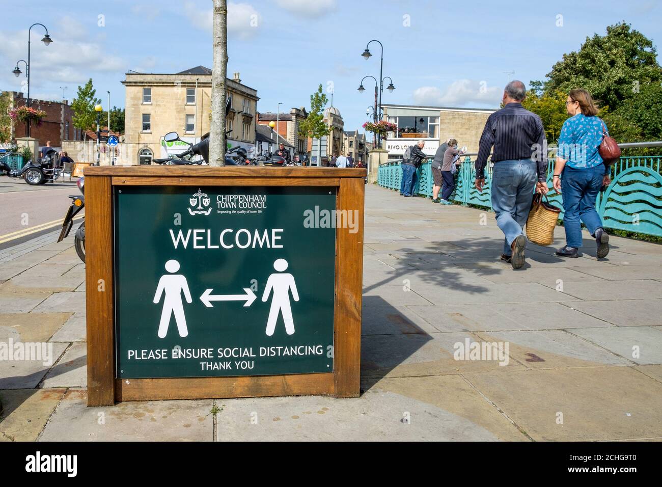 Social distancing signs to remind shoppers to abide by covid 19 social distancing rules are pictured in Chippenham, Wiltshire, UK Stock Photo