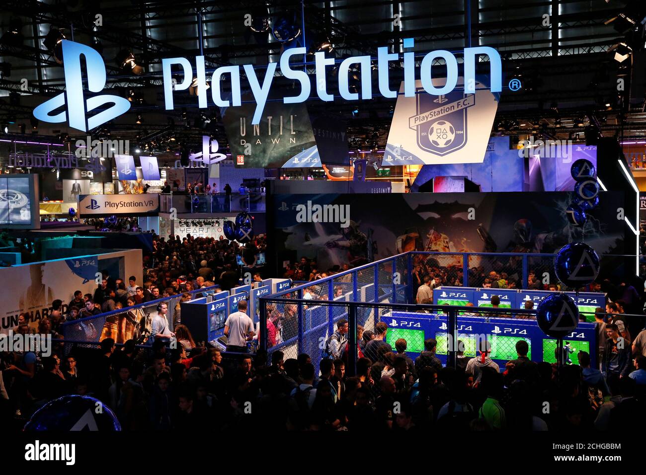 Visitors play games on PlayStation 4 (PS4) at the Paris Games Week, a trade  fair for video games in Paris, France, October 28, 2015. Paris Games week  will run from October 28