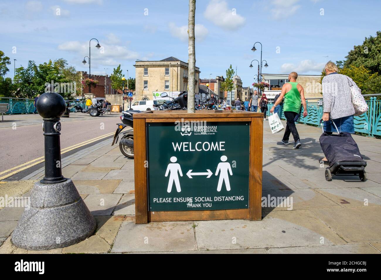 Social distancing signs to remind shoppers to abide by covid 19 social distancing rules are pictured in Chippenham, Wiltshire, UK Stock Photo