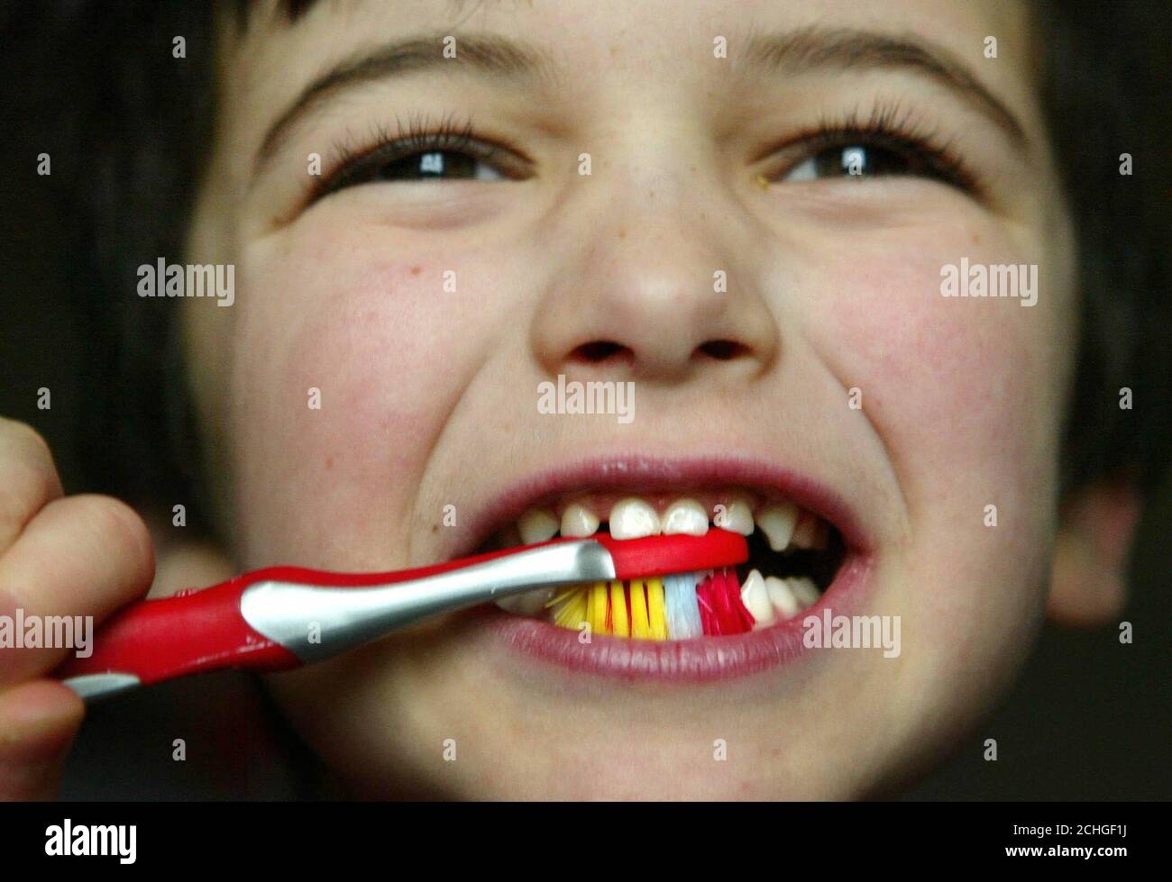 Undated posed photo of a young child brushing his teeth. As it is far more difficult to take a trip to the dentist or hygienist during lockdown, looking after your teeth is even more important than ever. Stock Photo
