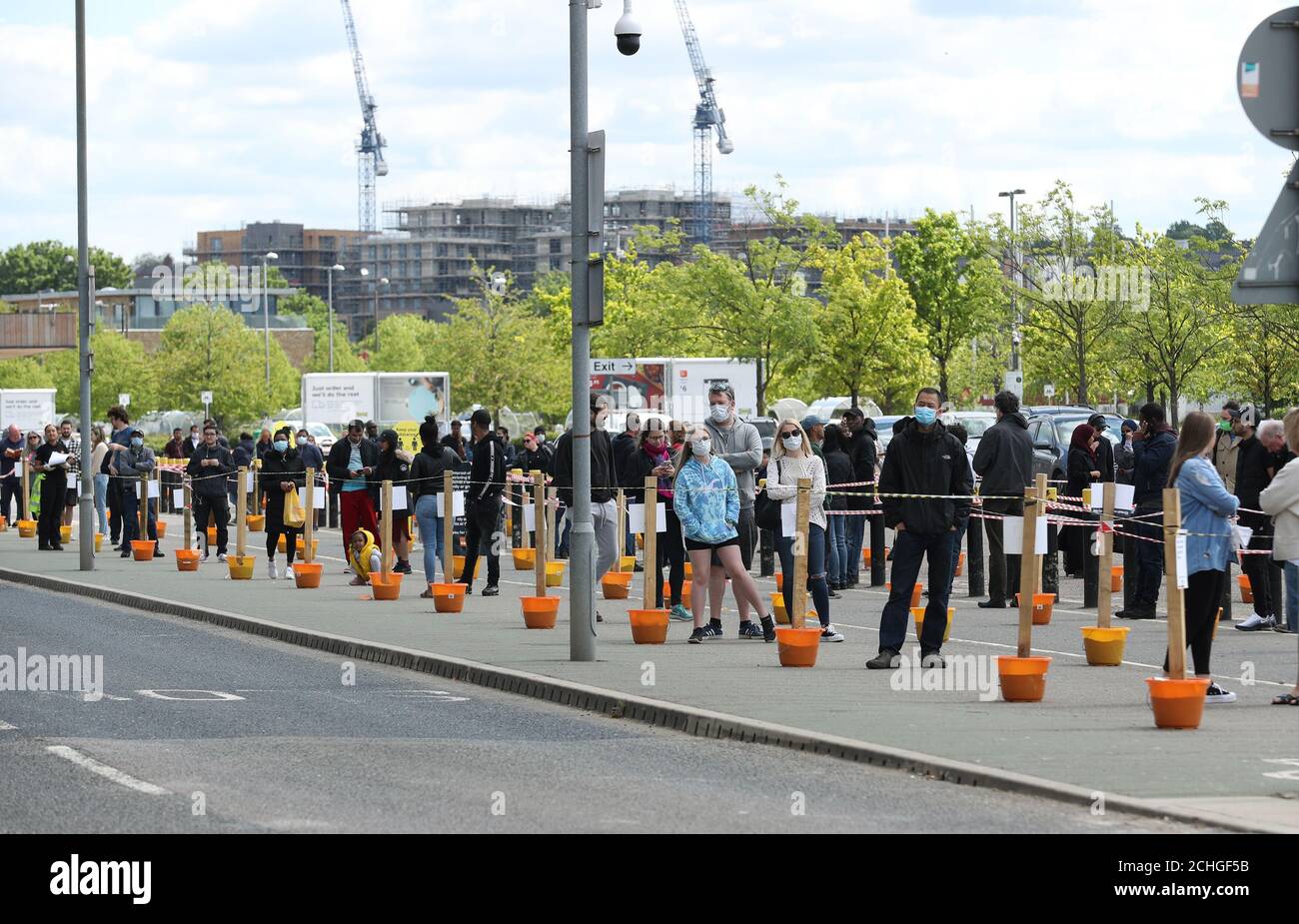 People queuing outside the B&Q Greenwich store, London Stock Photo Alamy